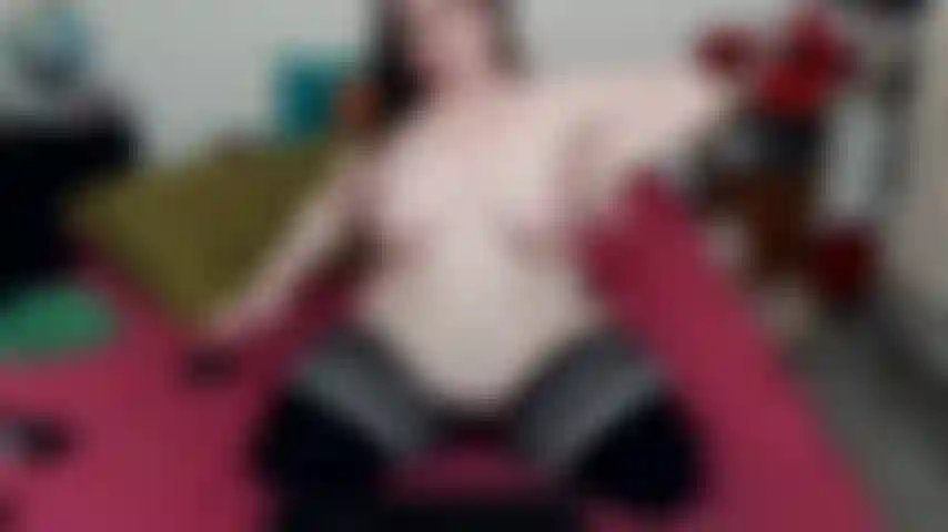 Tittenspiel in halterlosen strümpfen.