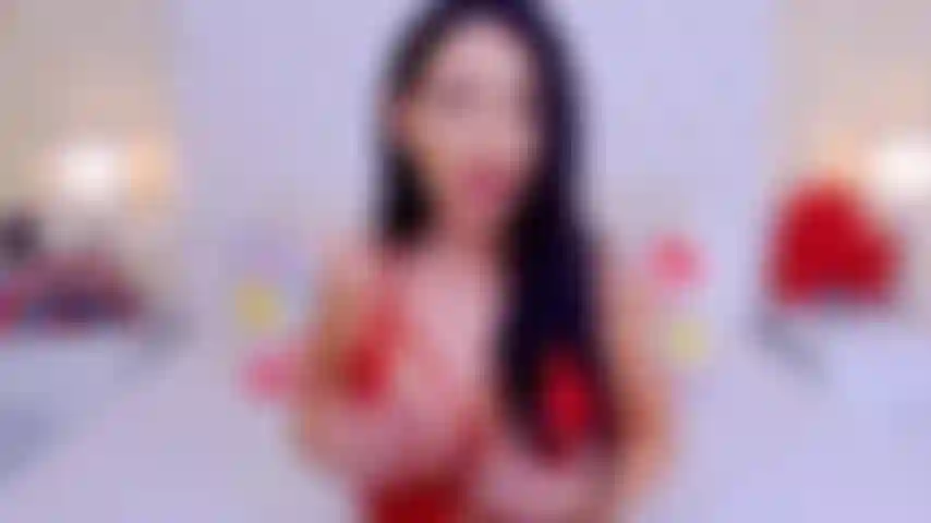 Eine brünette mit großen titten, die neckt und spielt.