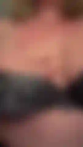 Sensually rubbing my boob...and enjoying it