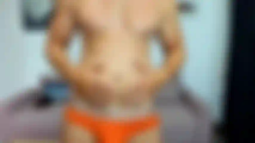 Nerdy jock gets his belly inflated whilst someone is touching him and can't help cumming on his belly.