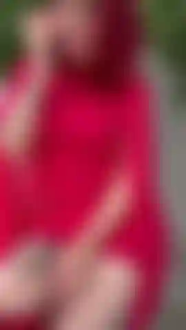 Sexy roof top tease in red dress