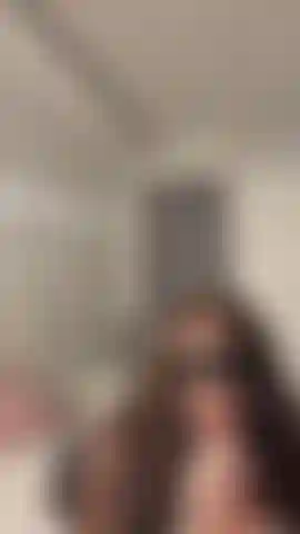 Sucking on a MASSIVE dildo