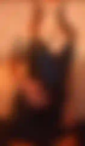 Sensual dancing, unzipping of dress to reveal underneath, bum shaking ;)