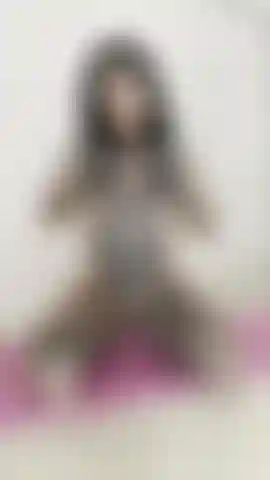 oiling my entire body in a micro bikini.