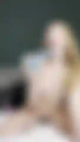 Naked sucking and bouncing on a dildo