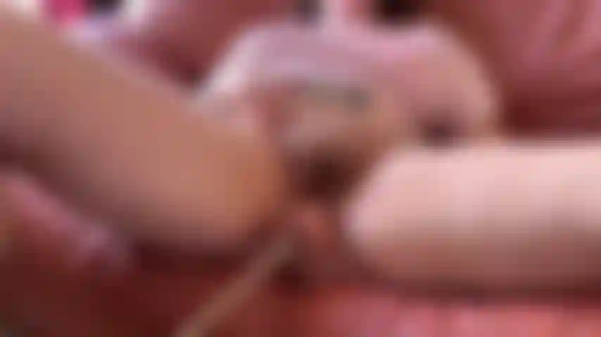 I'm lying on the couch with my legs spread wide, knees pulled back, exposing my thick, hairy pussy. The fuck machine rams its big dildo deep inside my wet, bushy cunt in powerful strokes, stretching and pounding me hard while I moan loudly, my hairy lips gripping the shaft as juices drip down my ass.