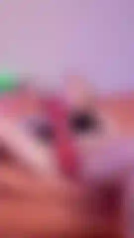 I spread my legs wide on the soft couch, knees bent and pulled back, exposing my tight, wet pussy completely. Gripping the thick dildo, I tease my swollen clit first, then thrust it deep inside me with a moan. I fuck myself hard and fast, hips bucking, the toy stretching and filling my dripping hole as juices run down my ass. My tits bounce with every powerful stroke, lost in pleasure.