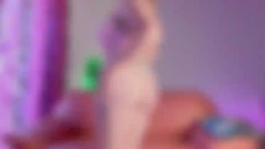 I slowly peel off my tight denim shorts, sliding them down my hips and kicking them away. Next I pull my pink top over my head, letting my big breasts bounce free. I hook my fingers into the grey panties and slide them off, exposing my hairy pussy.
I cup my heavy tits, squeezing and playing with them, then lift one to my mouth and suck my hard nipple hungrily. Lying back with legs spread wide open, I grab the huge dildo and push it deep into my hairy wet pussy. I fuck myself harder and faster, moaning louder as the pleasure builds until I cum hard, my body shaking. Then I turn over into doggy, ass up, and slide the thick dildo into my tight ass. I thrust it deep until the intense sensation makes me orgasm again, moaning uncontrollably.