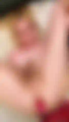 With my feet in the air, I jerk my uncut cock until I come right in my open mouth. Yum!