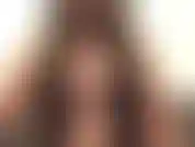 Muschi reiben in schwarzem durchsichtigem outfit mit halterlosen strümpfen. Orgasmus mit spielzeug.