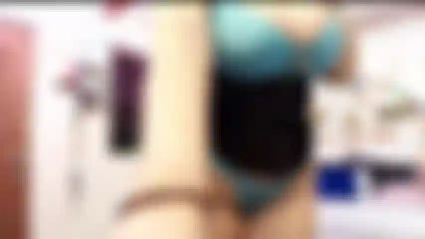 Sexy cowgirl does a striptease