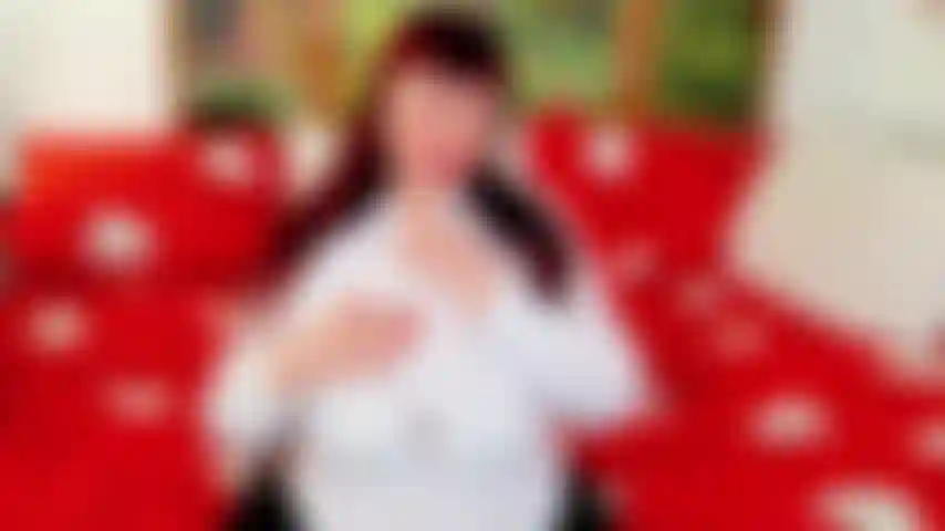 Taking off white blouse and bra