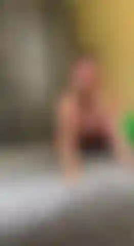 I'm lying on my stomach and giving a blowjob