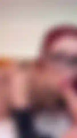 The redhead that vibrates in black lingerie