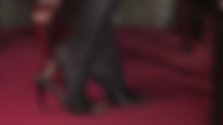 Teasing the foot lover with opaque black pantyhose feet and hot leather mules/slides.