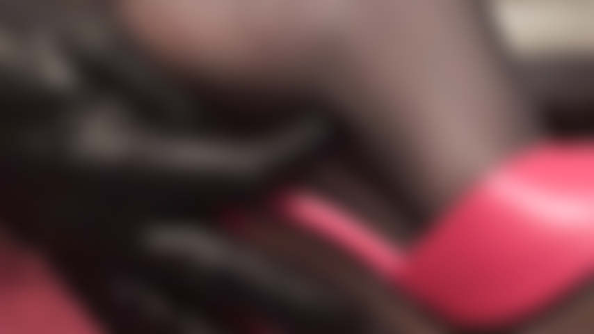 Upclose and personal with Mistress' heels and feet in black nylons and red mules.