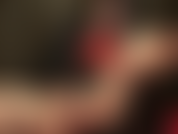 Mistress strokes her big cock while you worship her sexy bare feet.
