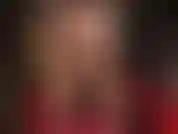 Die arschverehrung in hautfarbenen strumpfhosen und mit nacktem hintern betreibt.