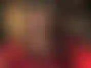 Heißer schwarzer lederminirock und strumpfhosen mit stilettos.