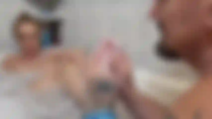 foot massage and wash in bubble bath