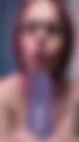 Trans Girl with Glasses Sucks a Purple Dildo