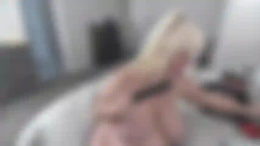 TITS HANGING WHILE I SUCK ON BLACK TOYS