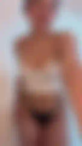 I'll turn you on a little while I pull down my panties and caress my pussy with my fingers and shake my ass