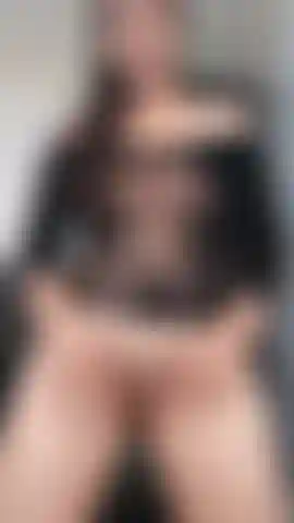 Teasing in lingerie, then slipping it off inch by inch.