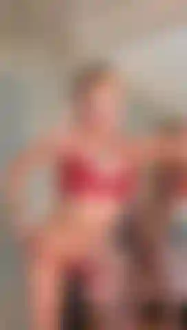 Spicy blonde and in a tempting red, wanna see more?