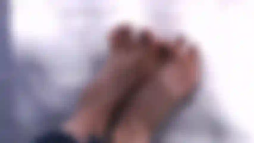 Long painted toes on my feet and high arches tease